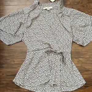 Cute crossover blouse. New with tag.